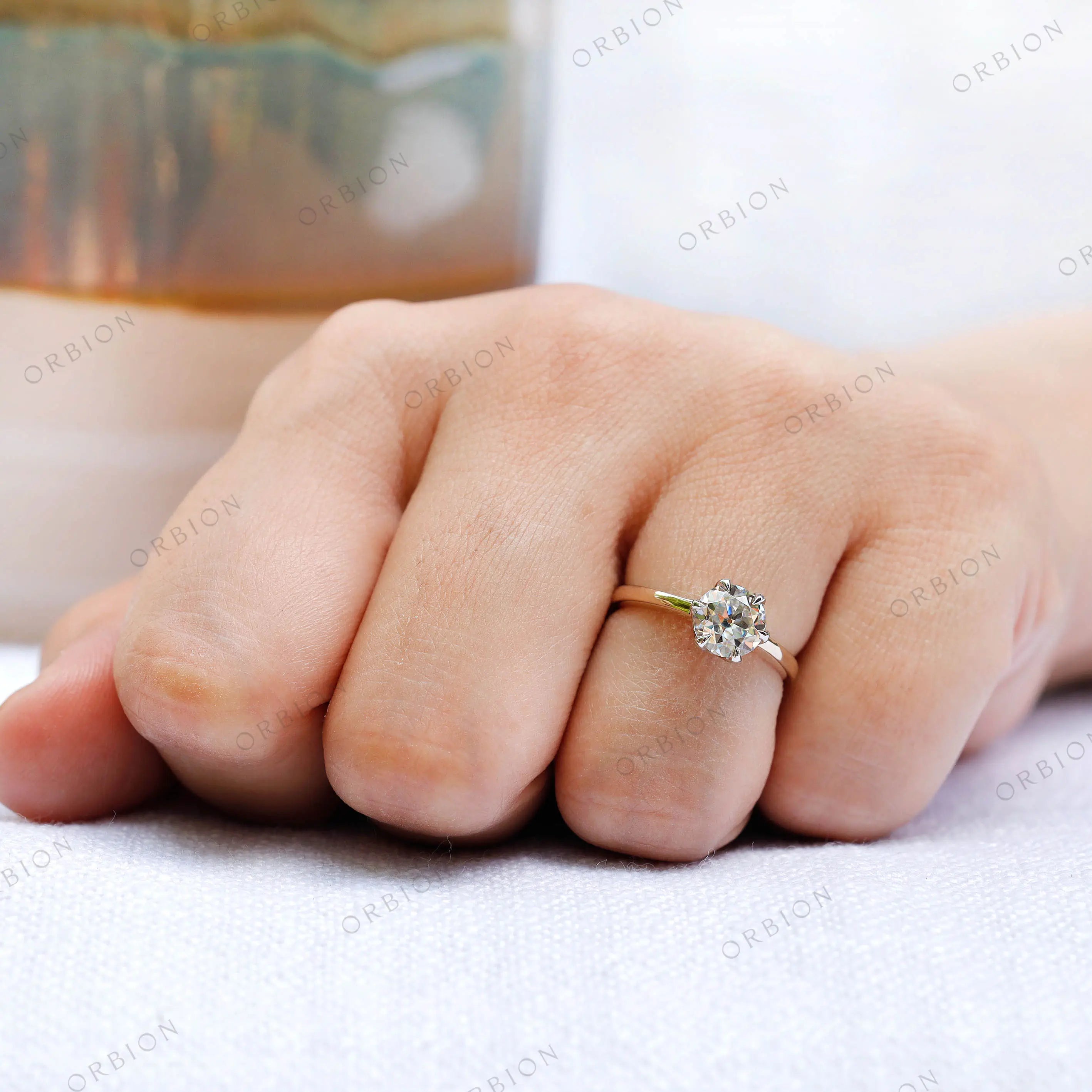 Hand shot of the Old European Cut Moissanite solitaire engagement ring