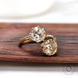 Round old European cut moissanite toi et moi ring close view
