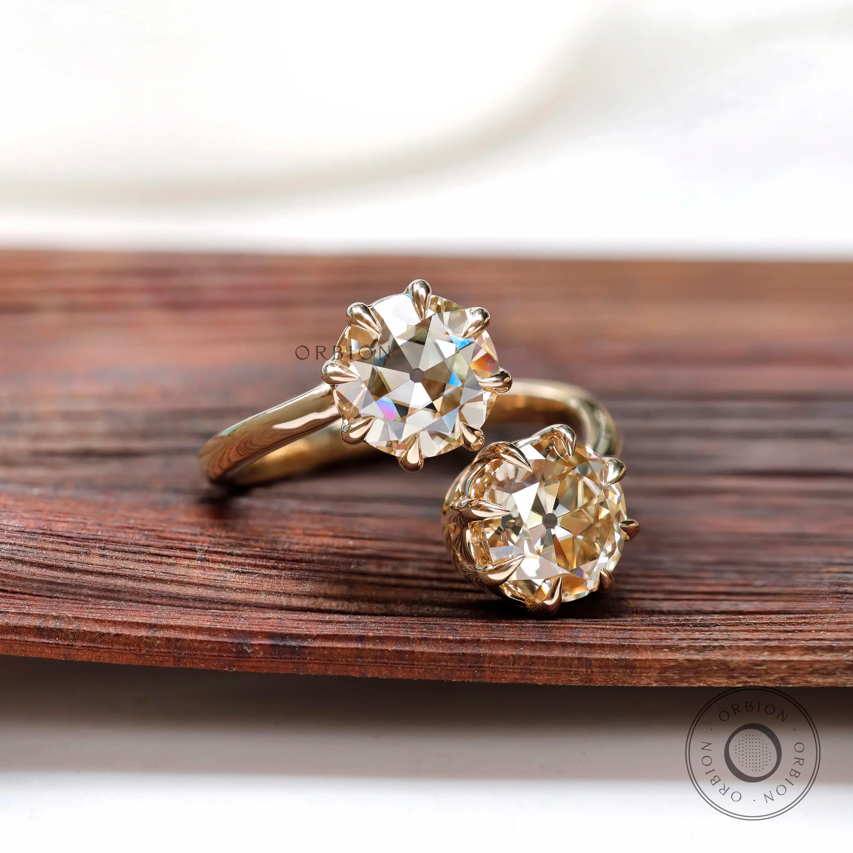 Round old European cut moissanite toi et moi ring close view