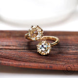 Toi et moi moissanite open engagement ring in 10k yellow gold