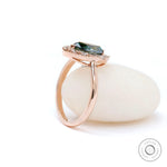 14k Rose Gold Marquise Blue Green Moissanite Engagement Ring Angle View