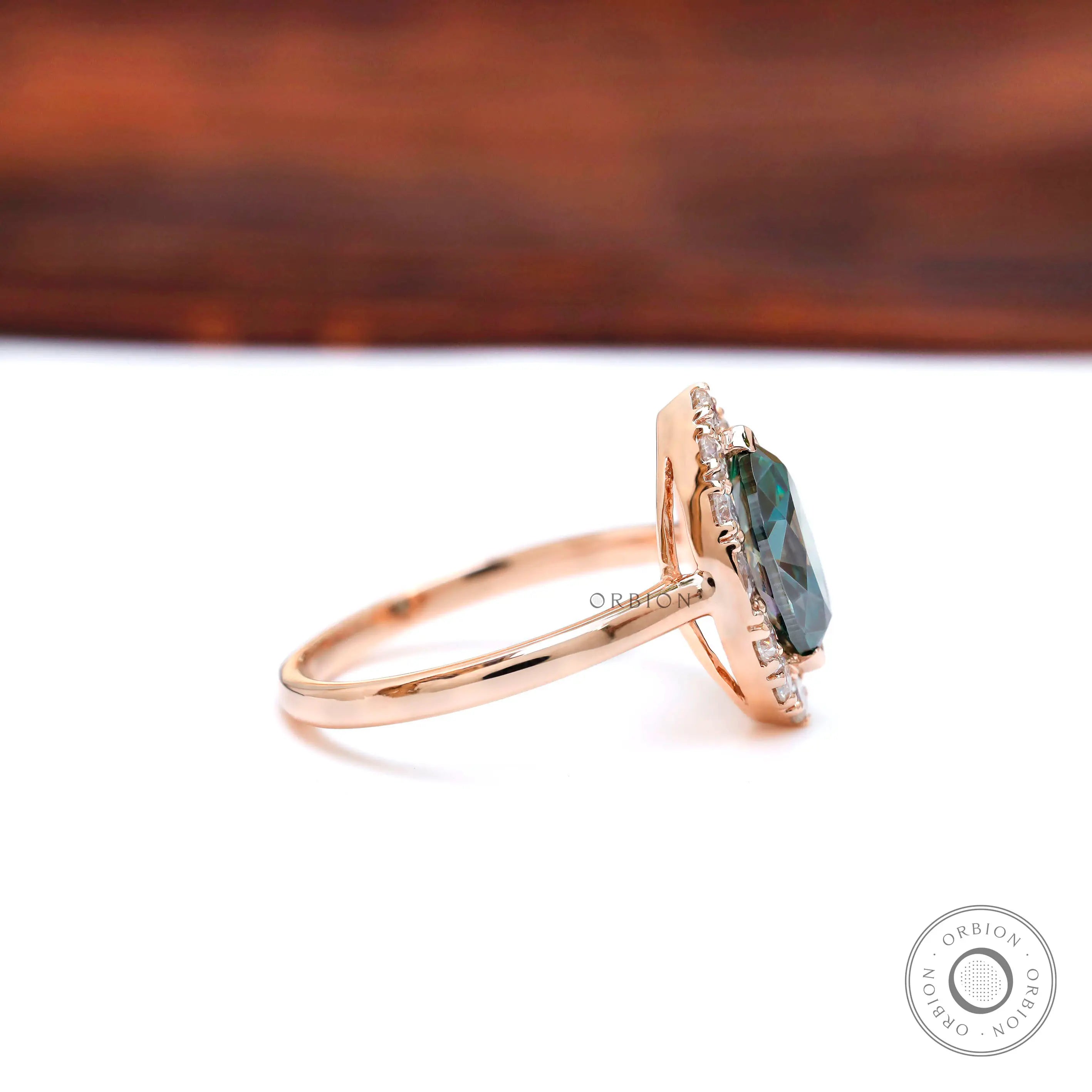 Rose Gold Marquise Teal Moissanite Engagement Ring Side View 