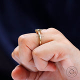 Top view of round champagne moissanite solitaire ring