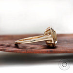 Side profile of elongated cushion moissanite bezel solitaire ring