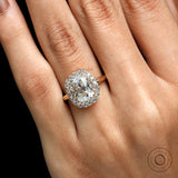 Cushion cut champagne stone halo ring close up
