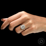Old mine cut champagne elongated cushion engagement ring on fingure