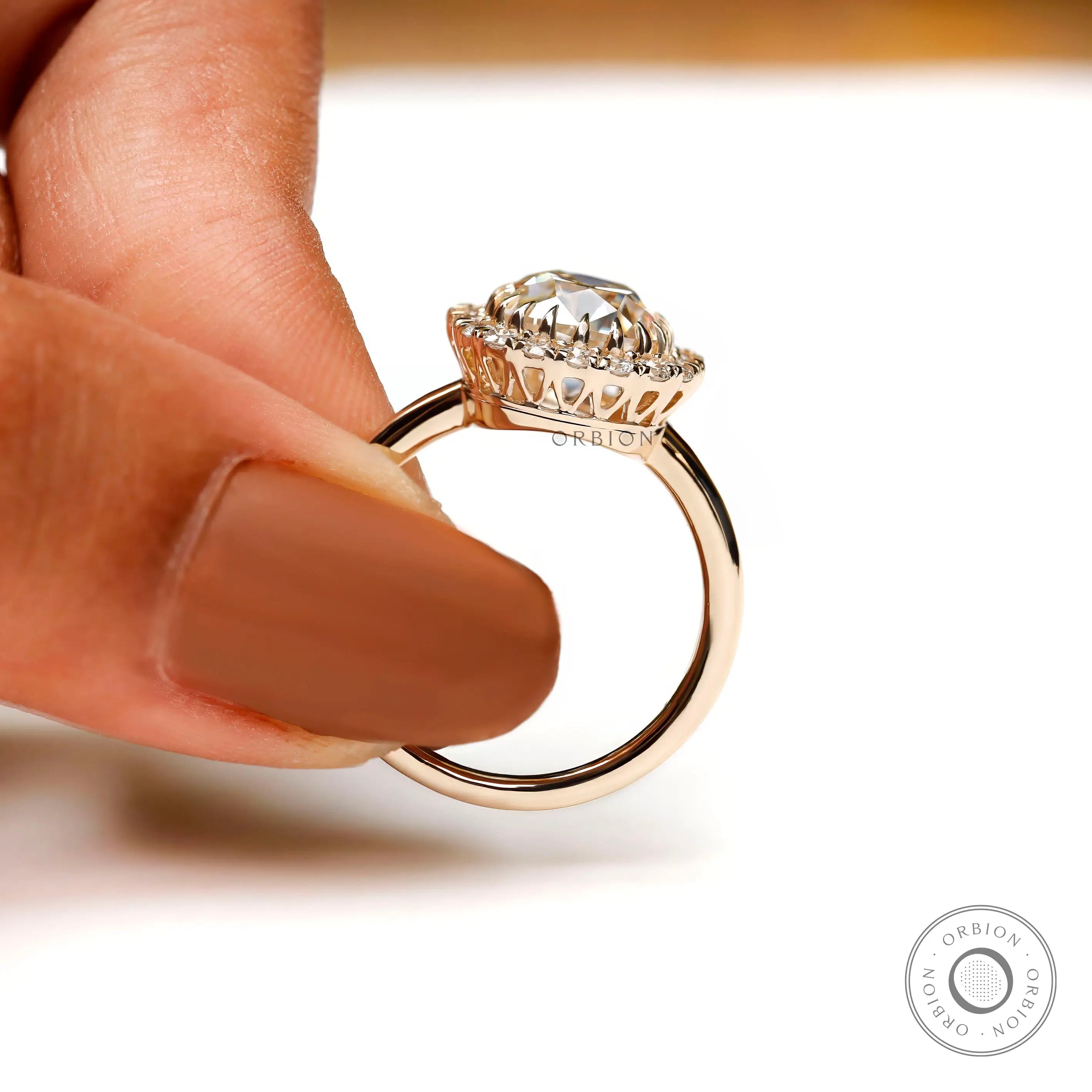 Old mine cut champagne elongated cushion engagement ring front view
