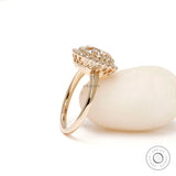 Slim band halo engagement ring yellow gold