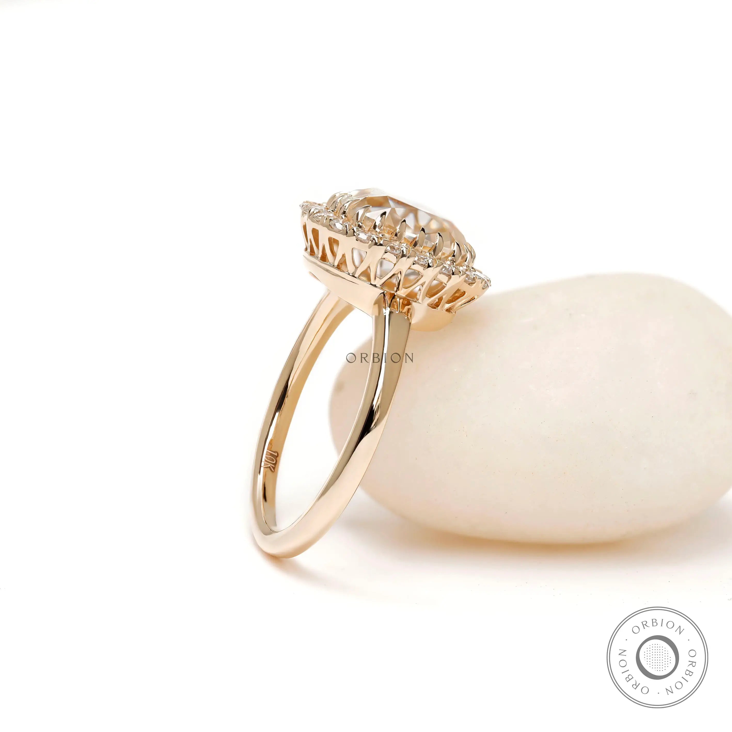 Slim band halo engagement ring yellow gold