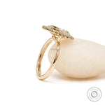 Antique style champagne moissanite engagement ring yellow gold
