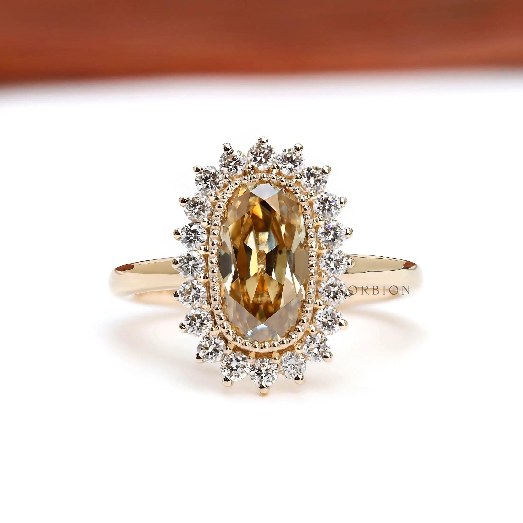 Vintage inspired champagne moissanite halo engagement ring in yellow gold