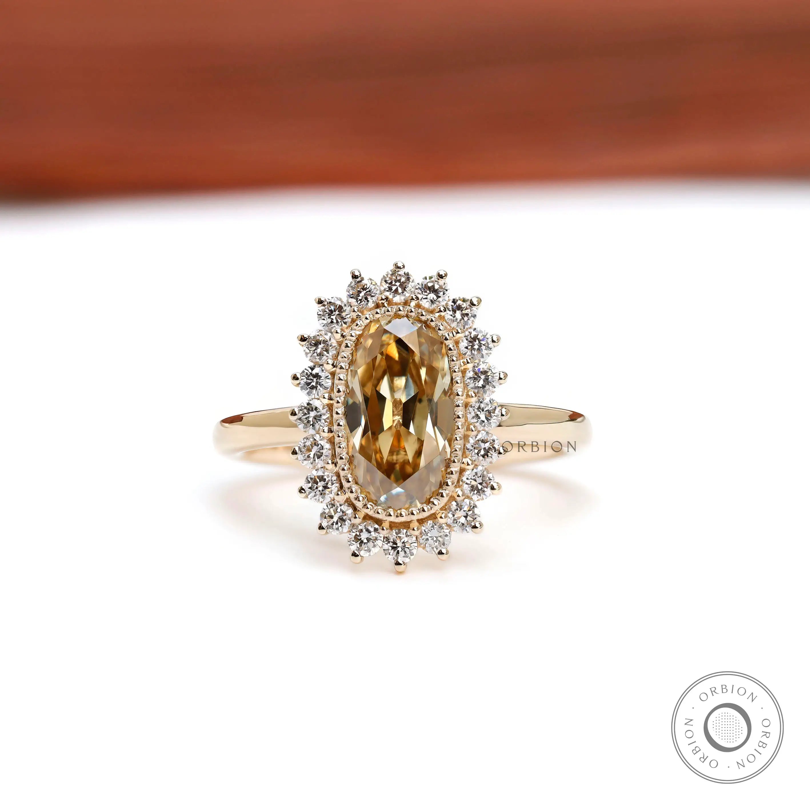 Vintage inspired champagne moissanite halo engagement ring in yellow gold