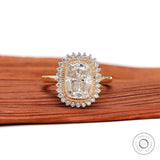 Elongated cushion halo moissanite milgrain bezel engagement ring in yellow gold 