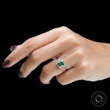 On-hand angled view highlighting sparkle and cluster proportions