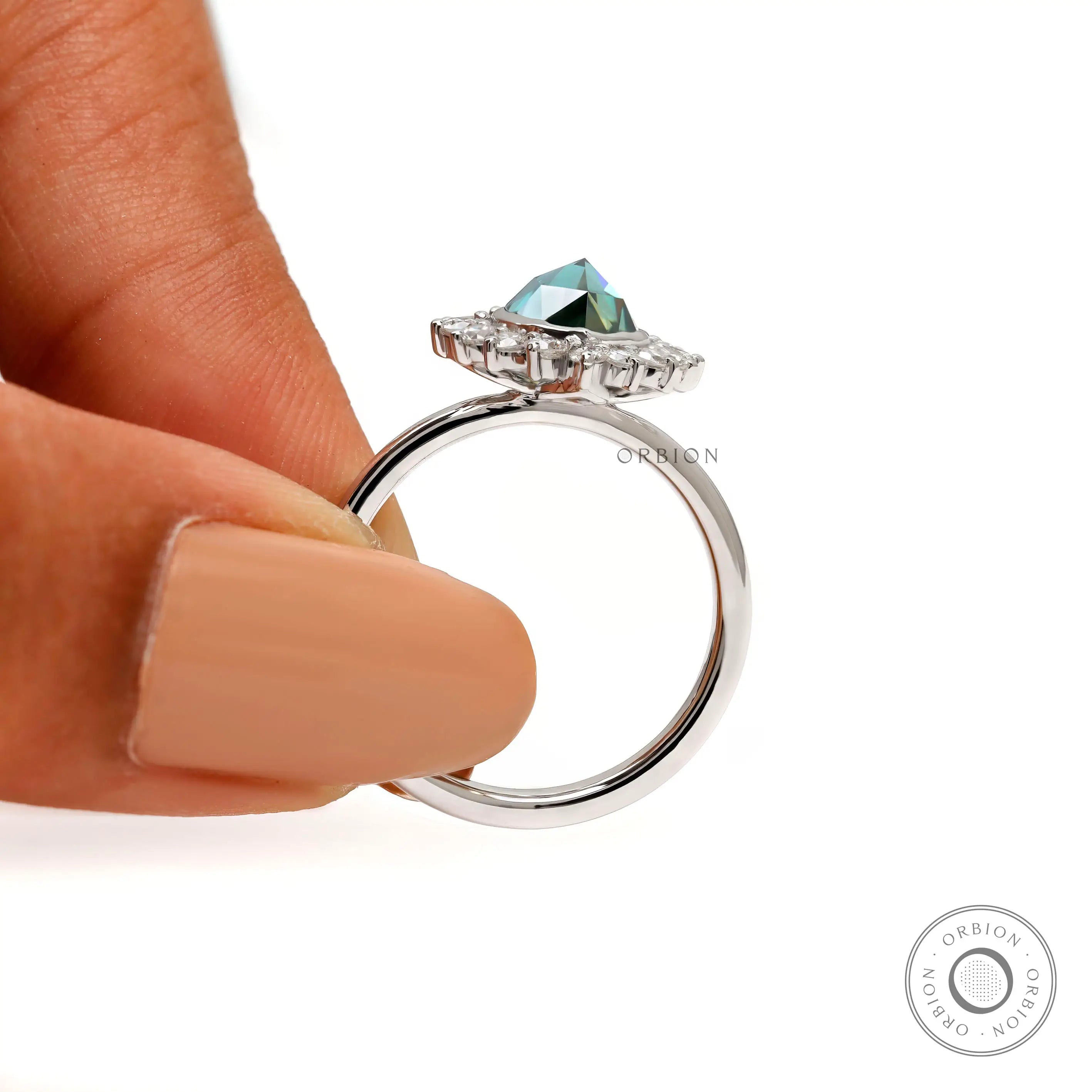 Side profile pear moissanite floral cluster ring