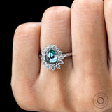 Close up pear blue green moissanite floral cluster