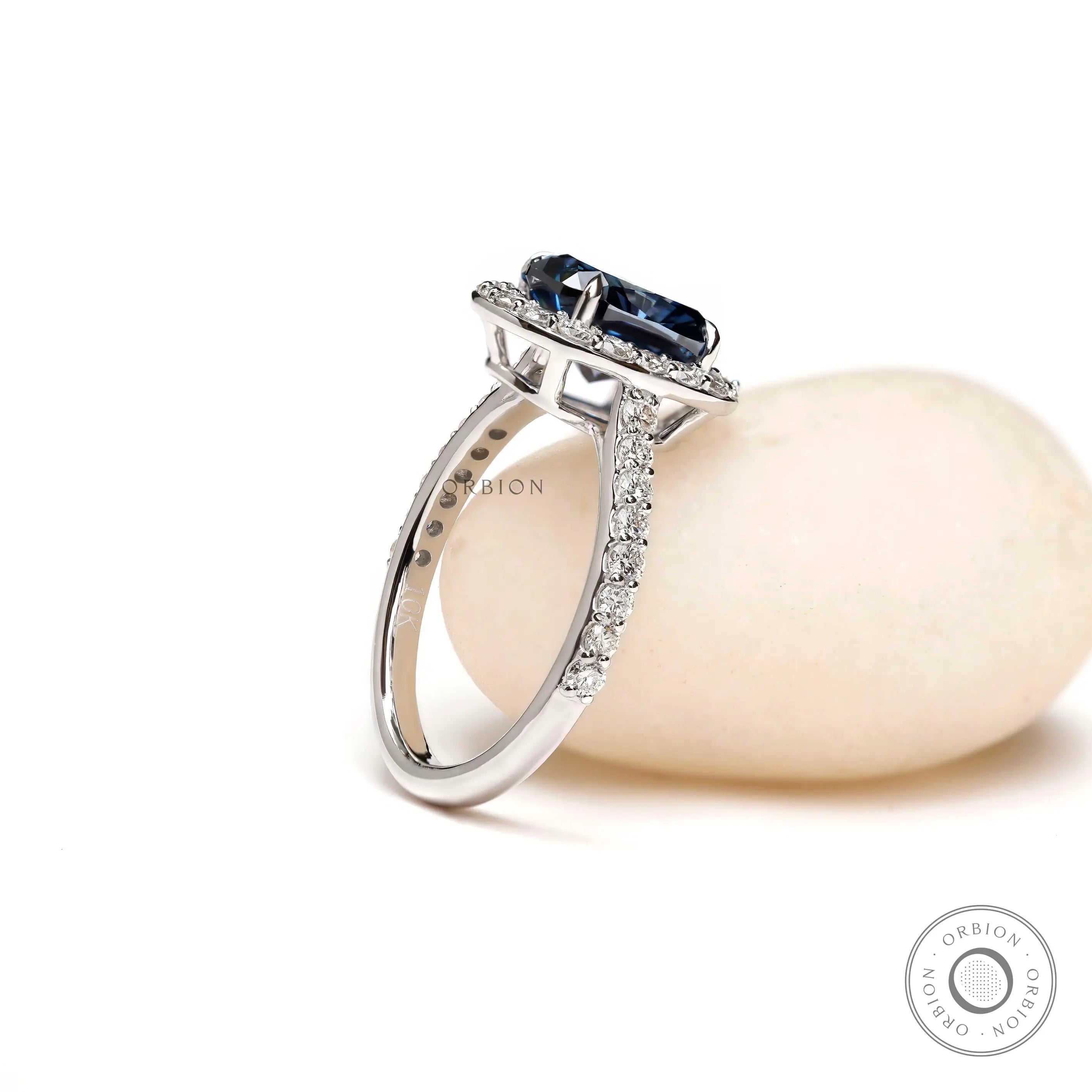 Luxury blue moissanite engagement ring photography