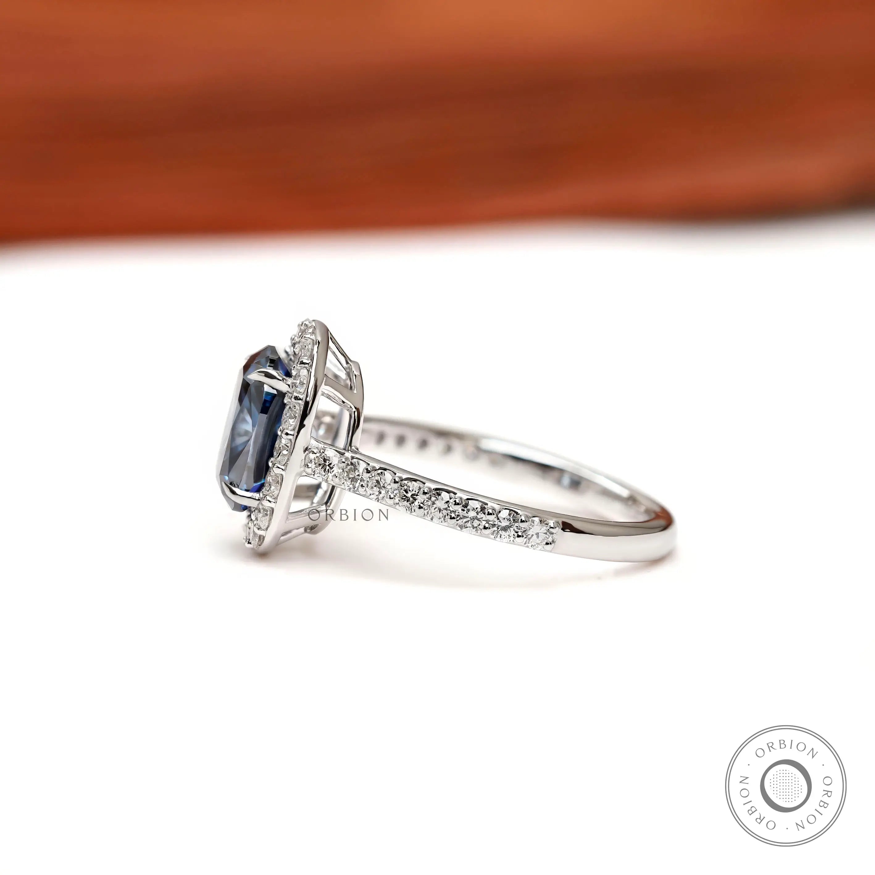 Pave band white gold halo engagement ring