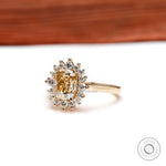 Side profile of champagne moissanite halo ring with four prongs