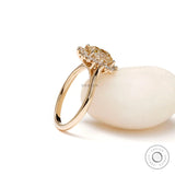 Vintage inspired halo engagement ring in 14k yellow gold angle view