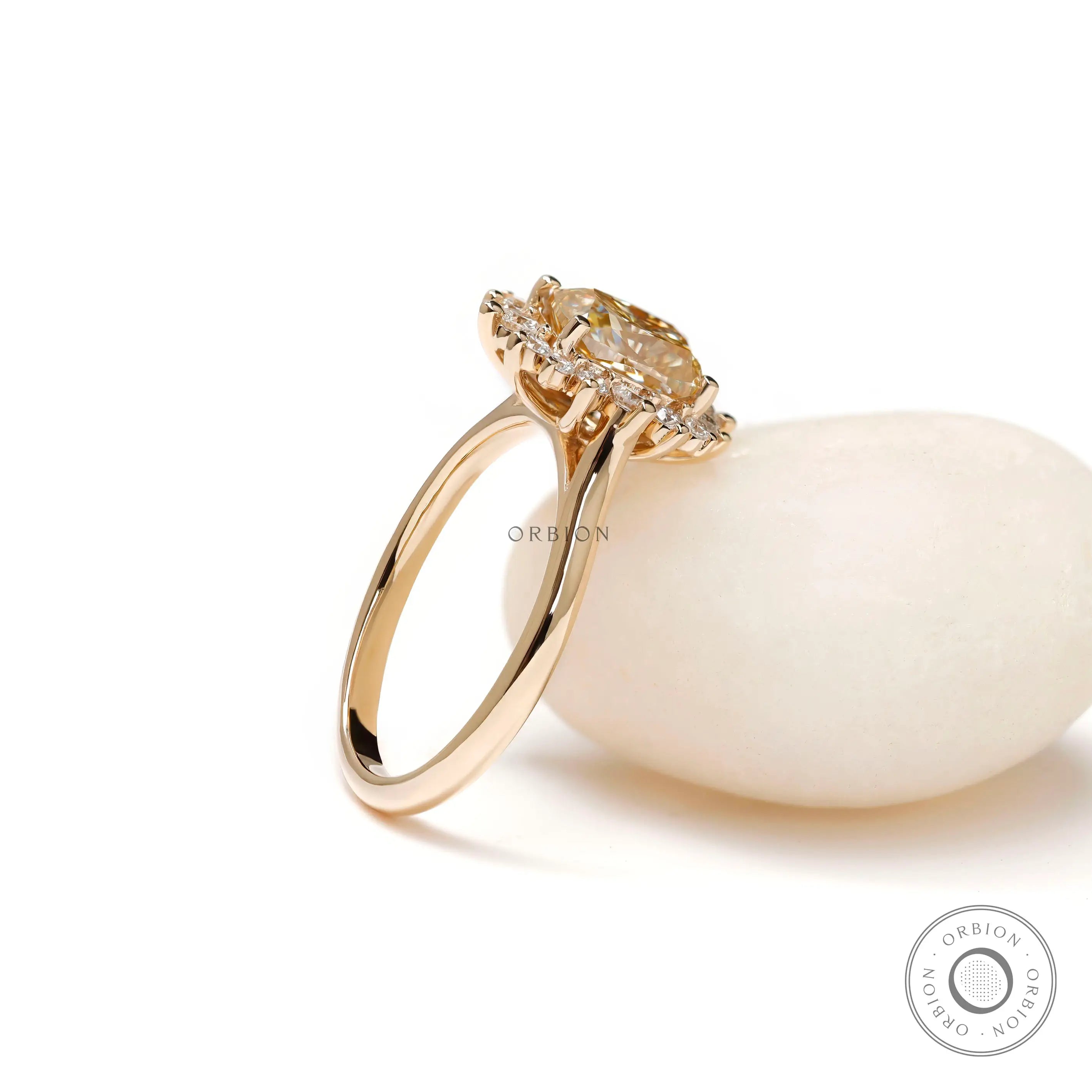 Vintage inspired halo engagement ring in 14k yellow gold angle view