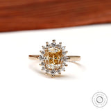 Elongated cushion yellowish champagne moissanite halo engagement ring front view