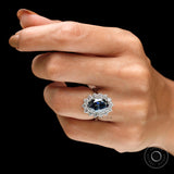 18k white gold oval blue moissanite halo wedding ring close up