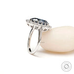 Elegant oval blue moissanite halo ring glossy finish