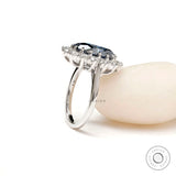 Elegant oval blue moissanite halo ring glossy finish