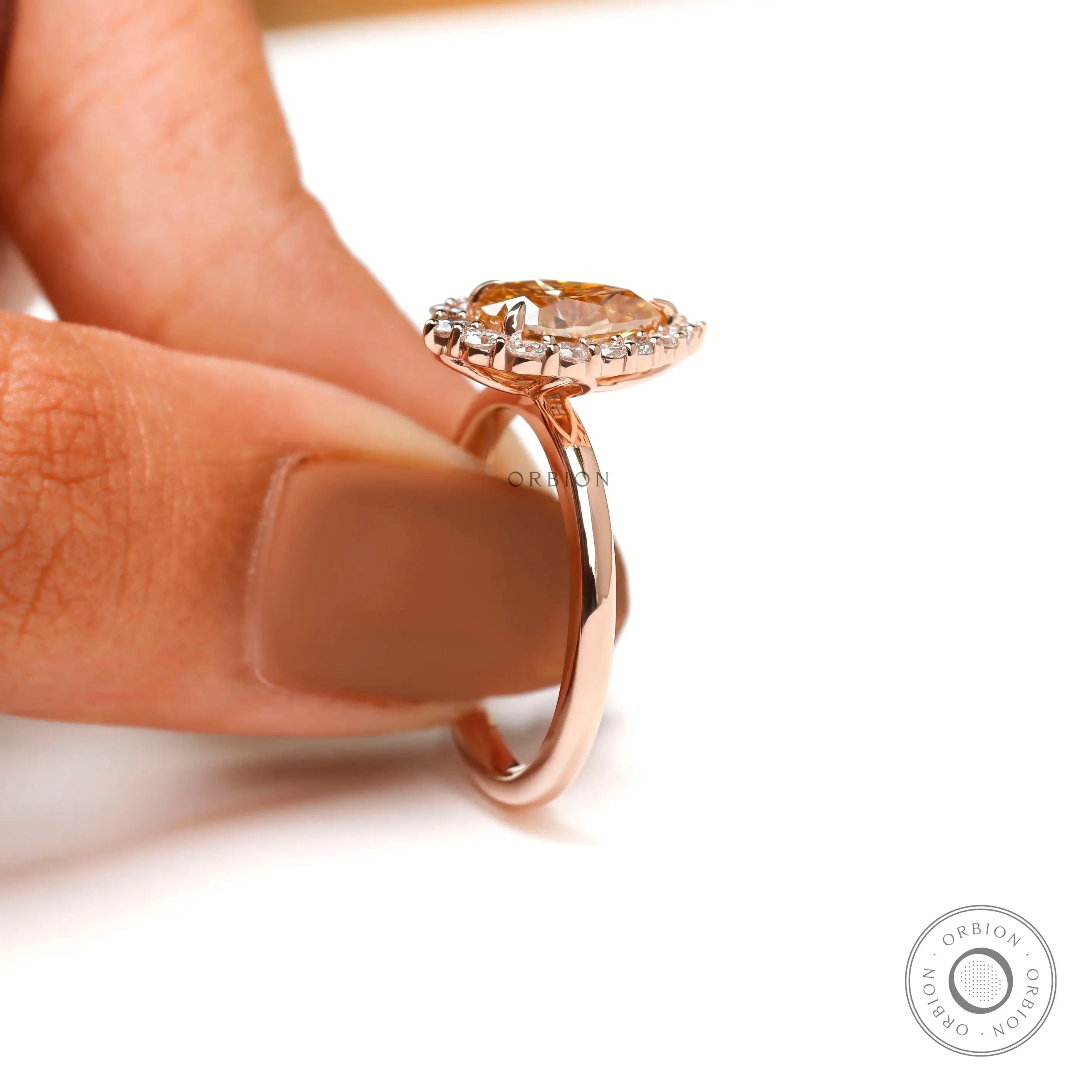 Halo moissanite ring with rose gold band