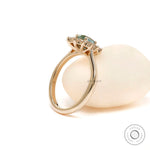 Oval halo ring minimalist yellow gold cathedral shank