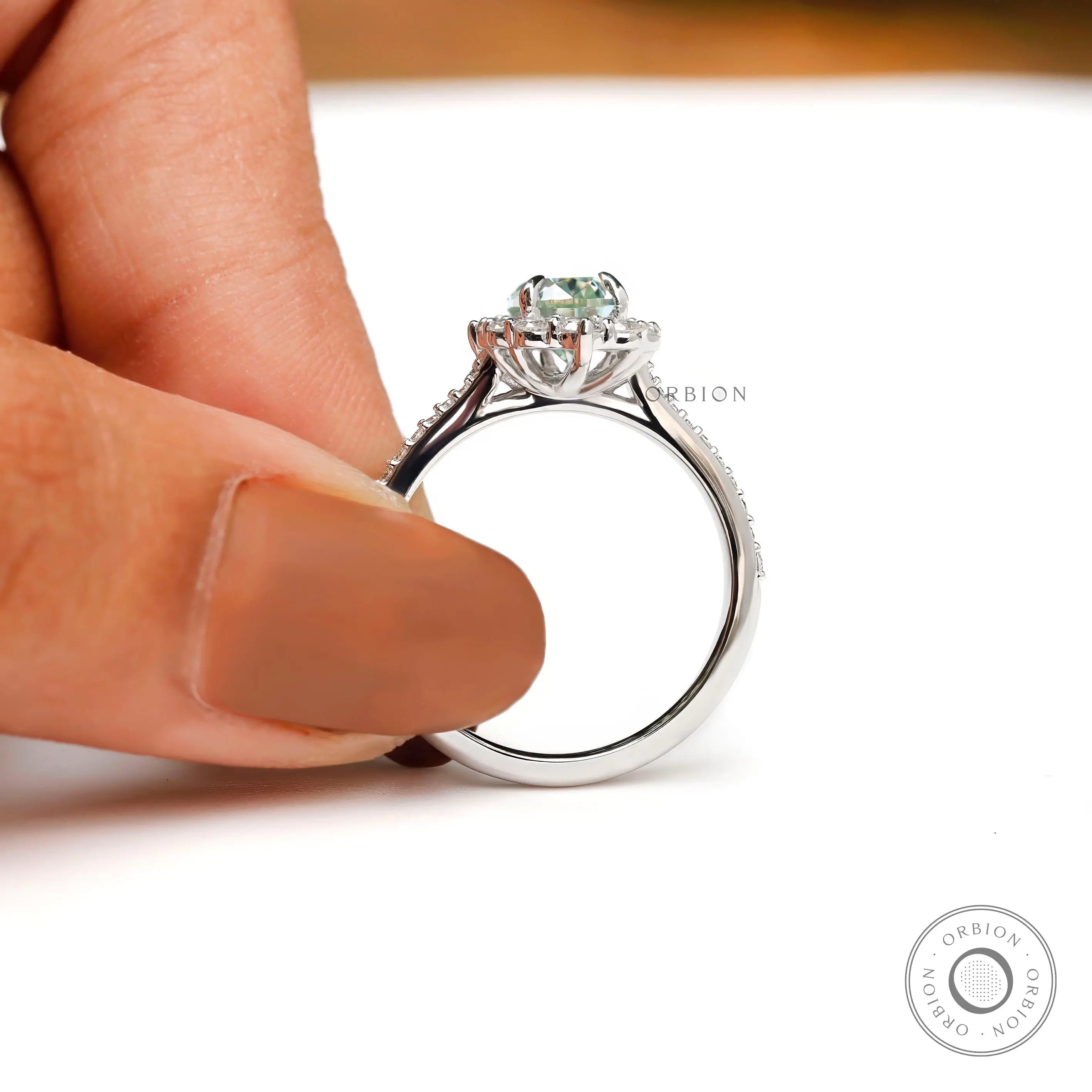 Pave band halo engagement cathedral ring with light green moissanite