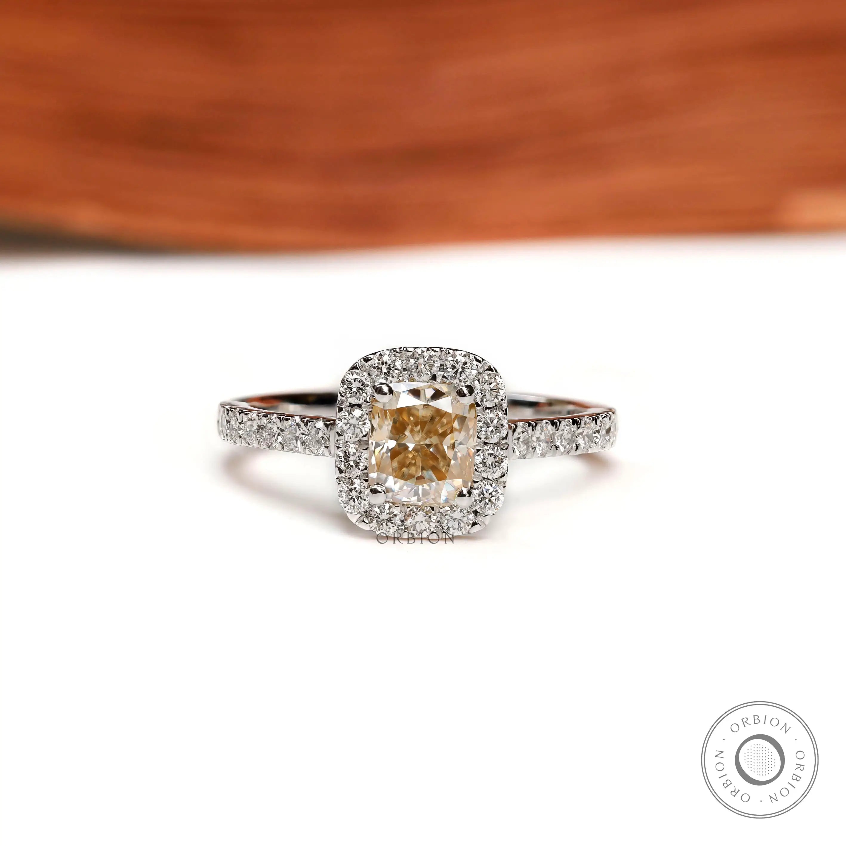 Cushion cut yellowish champagne moissanite halo engagement ring white gold