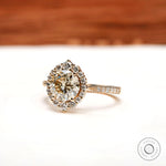 Side profile of round halo engagement ring 