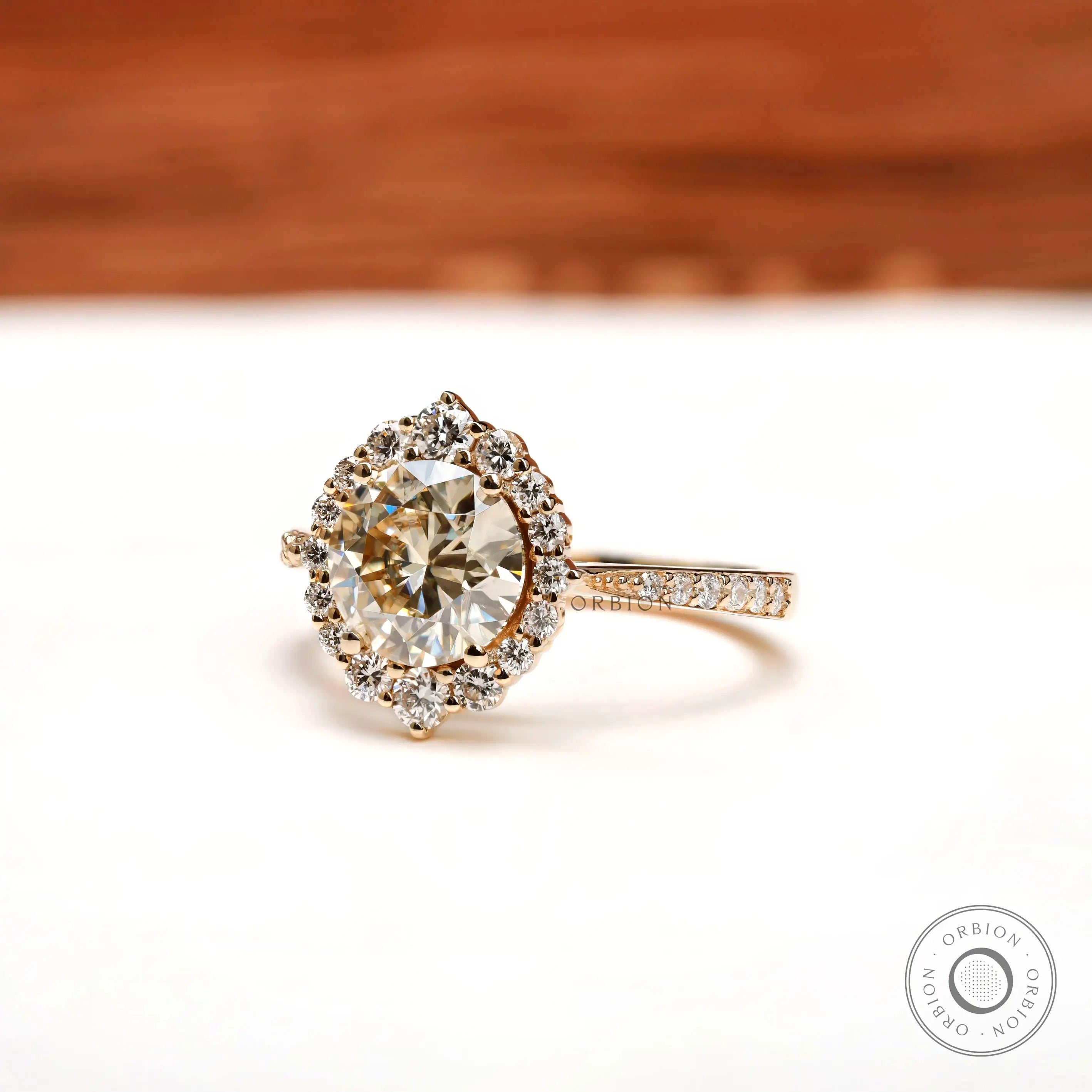 Side profile of round halo engagement ring 