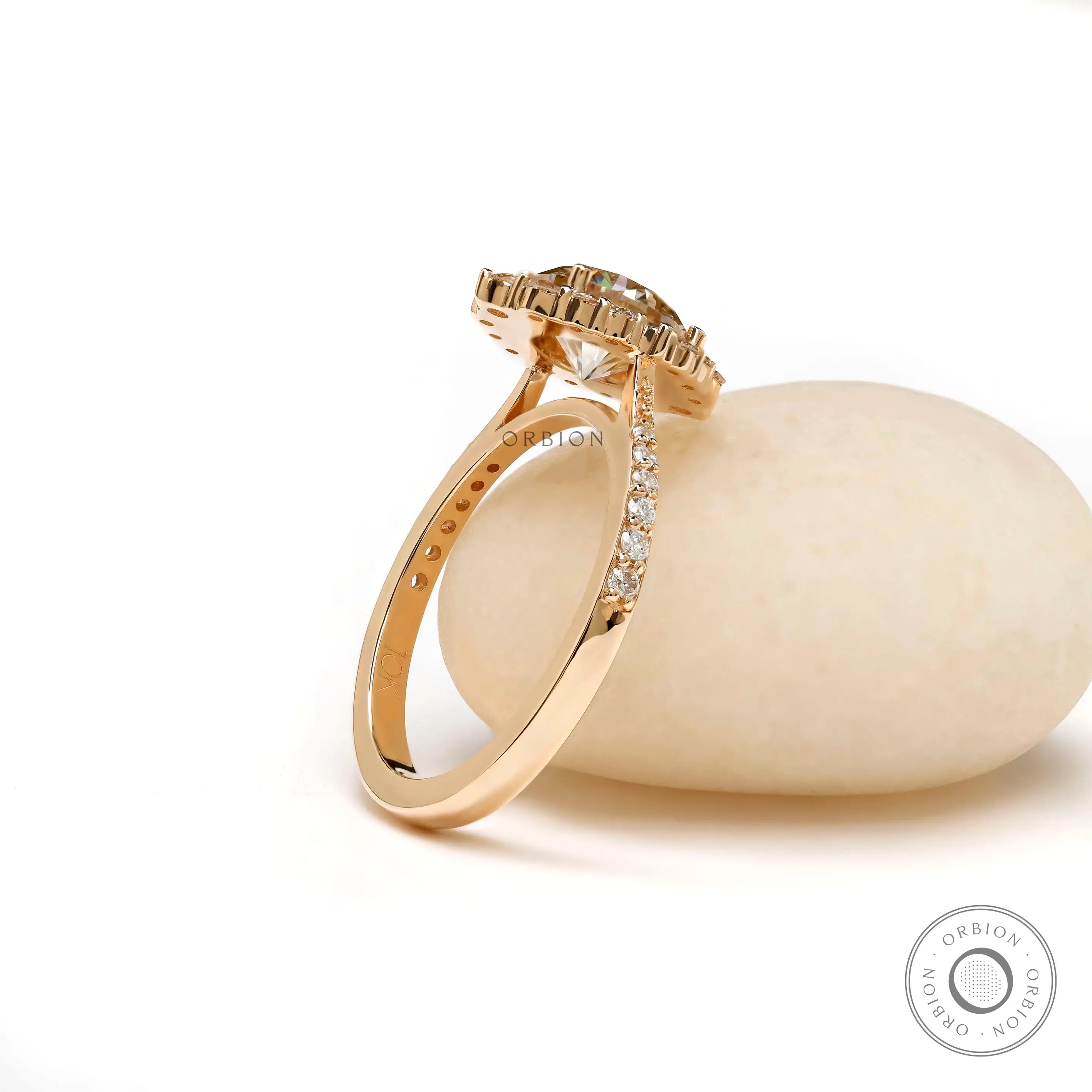 Elegant halo engagement ring with diamond accented band