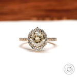Yellowish champagne moissanite halo engagement ring in 14k yellow gold
