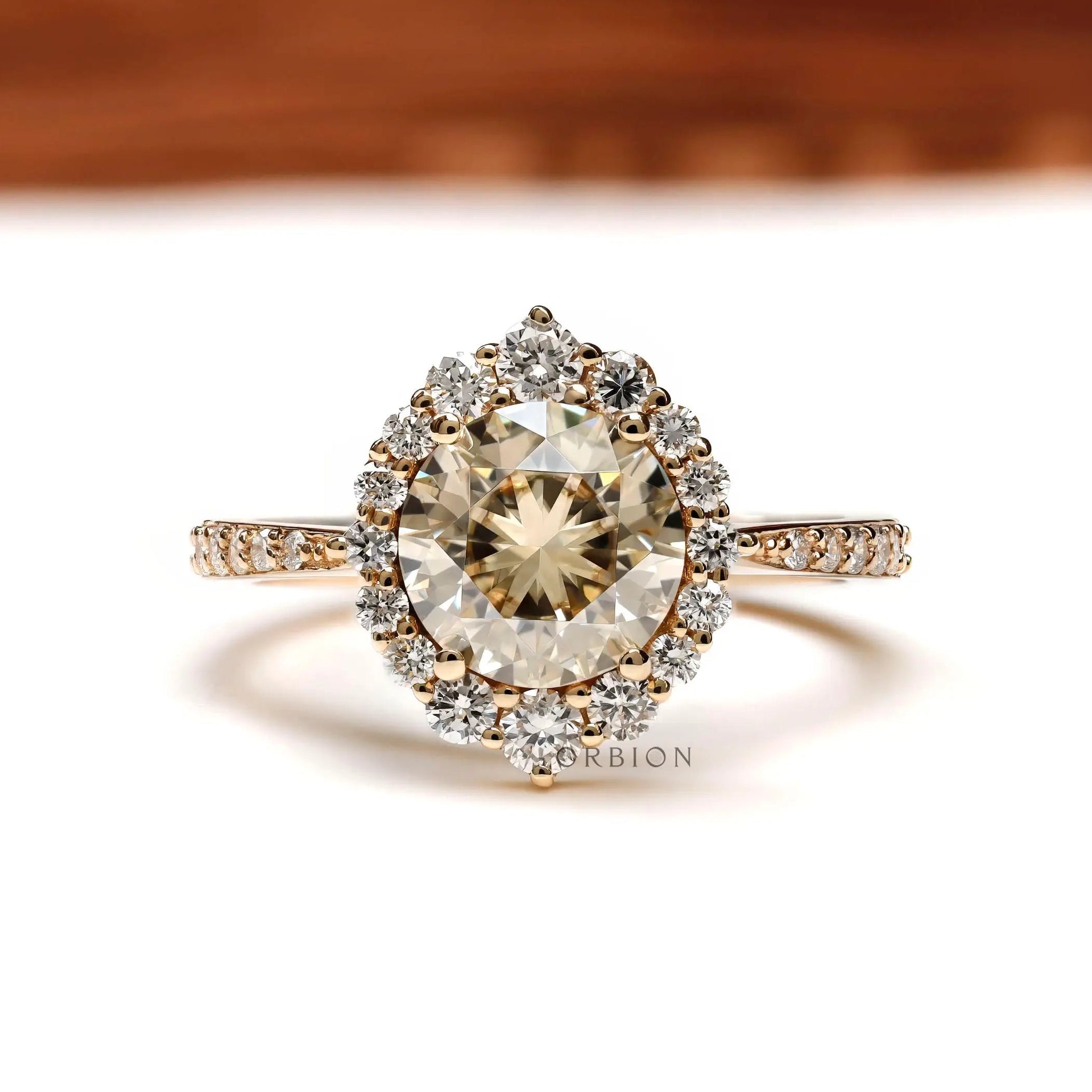 Yellowish champagne moissanite halo engagement ring in 14k yellow gold