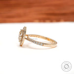 Pave shank moissanite engagement ring in yellow gold