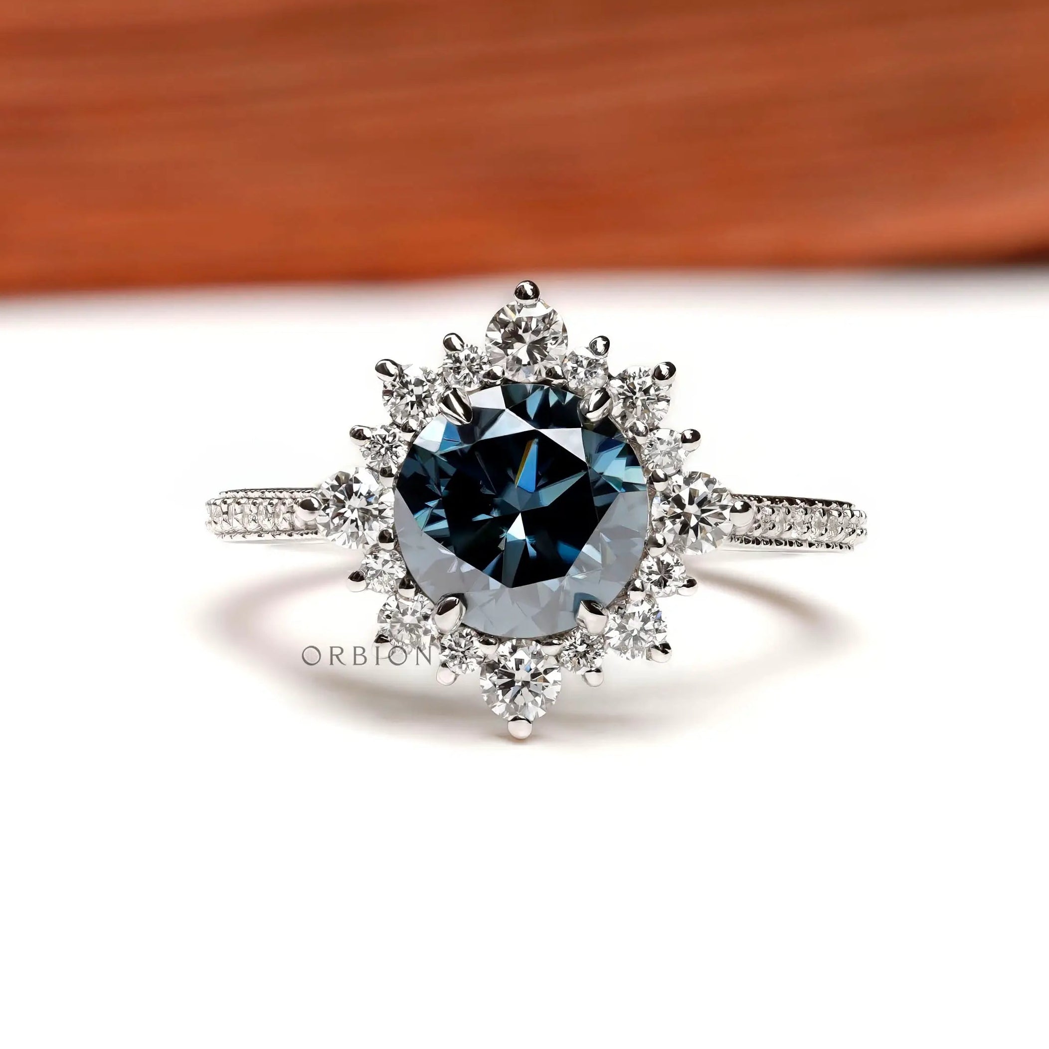 Dark grey moissanite halo engagement ring in 14k white gold