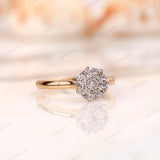 Round diamond cluster ring with high polish yellow gold band