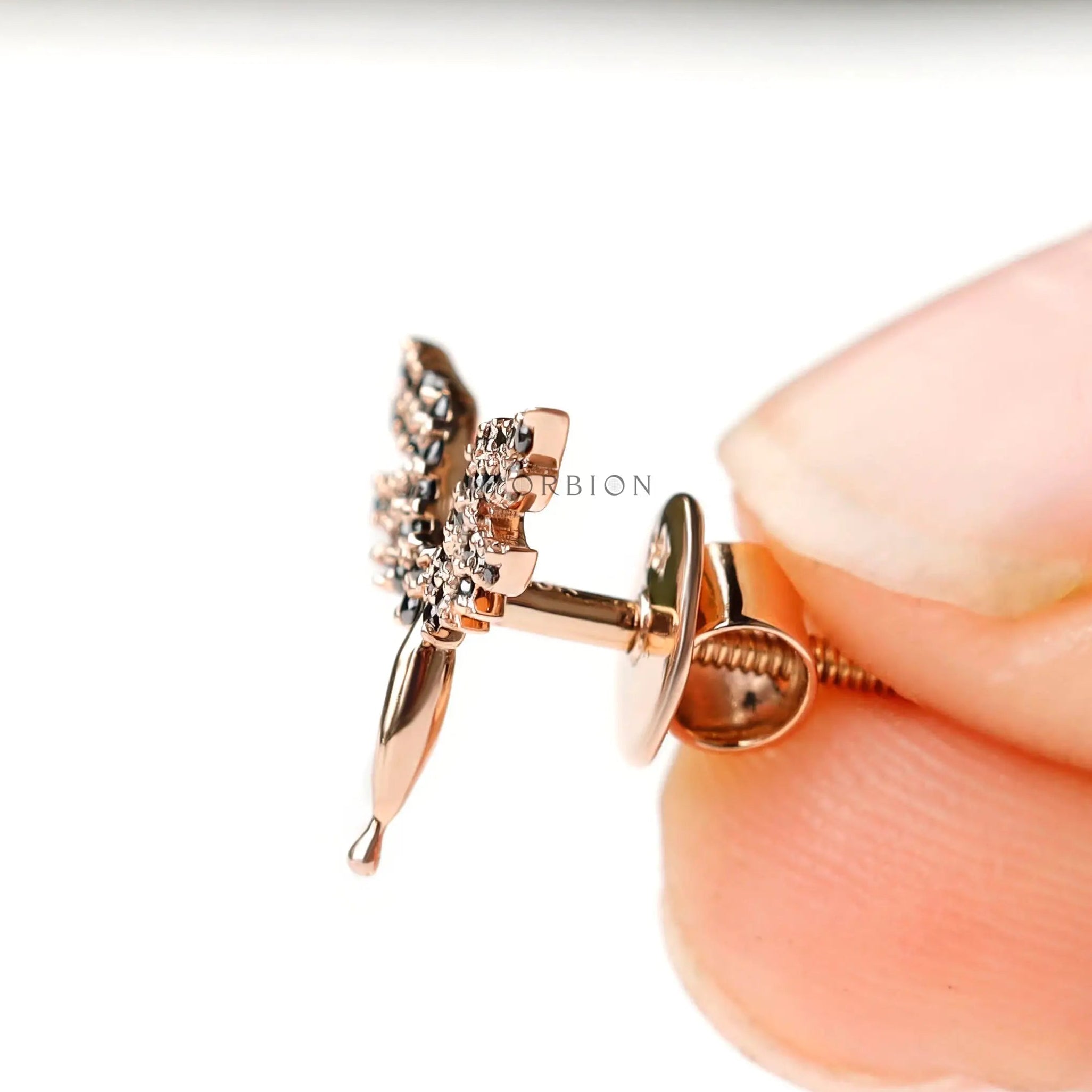 18K rose gold flying angel earrings with brilliant black moissanite