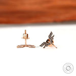 Minimal angel wing stud earrings with black moissanite detailing