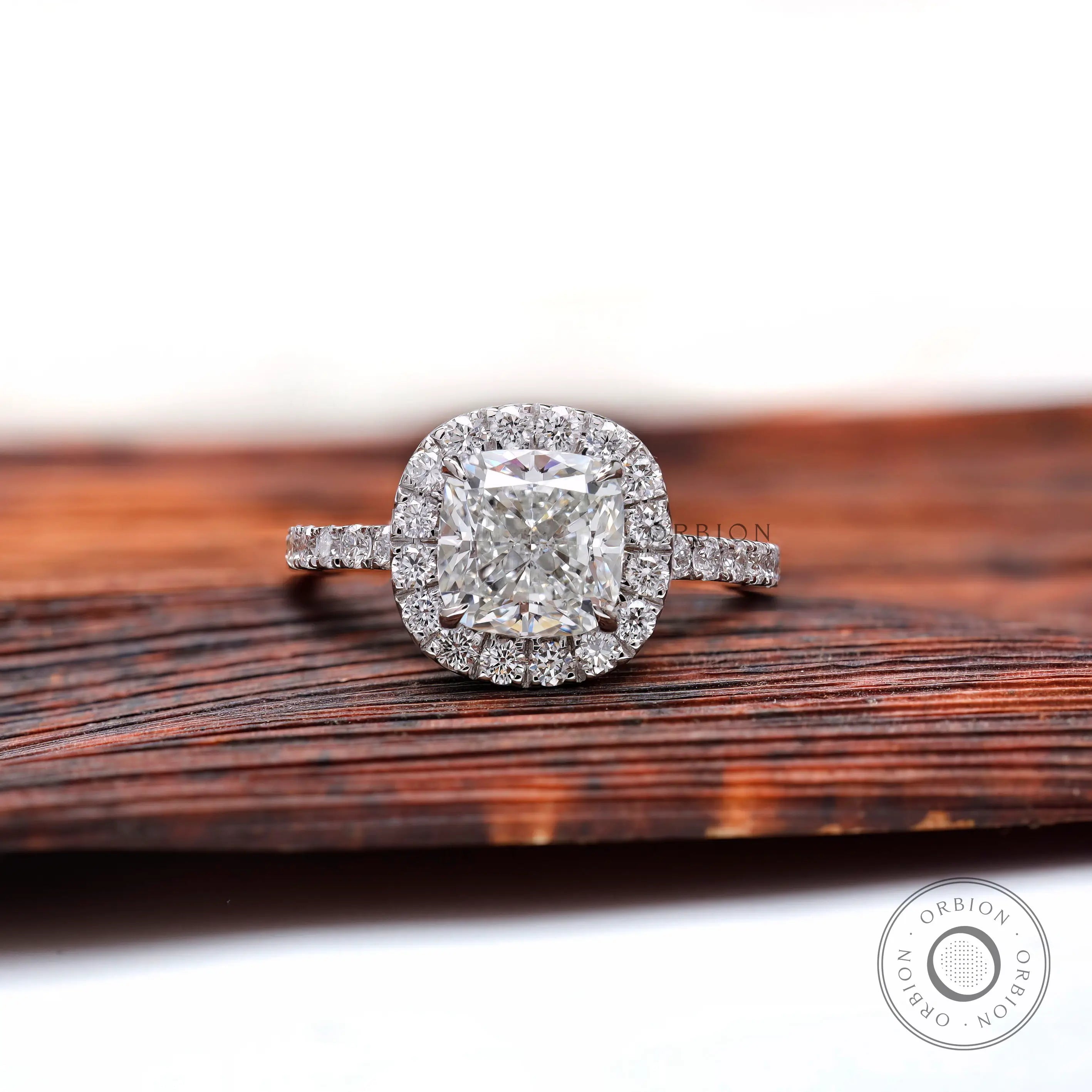 Cushion cut lab grown diamond cluster halo ring in 18K white gold, front view