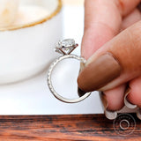 Pavé band detail of cushion cluster halo ring in white gold