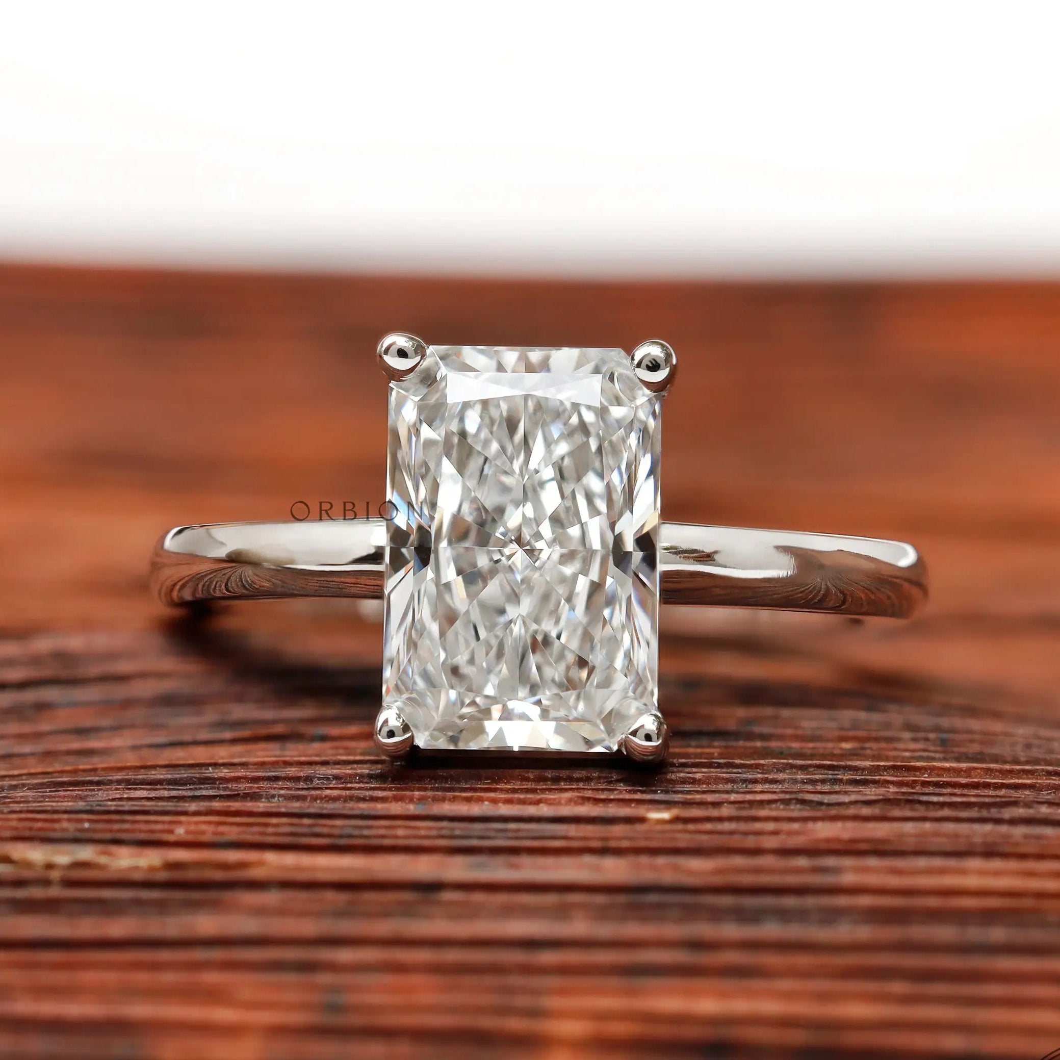 Radiant cut lab grown diamond solitaire ring in 14K white gold front view