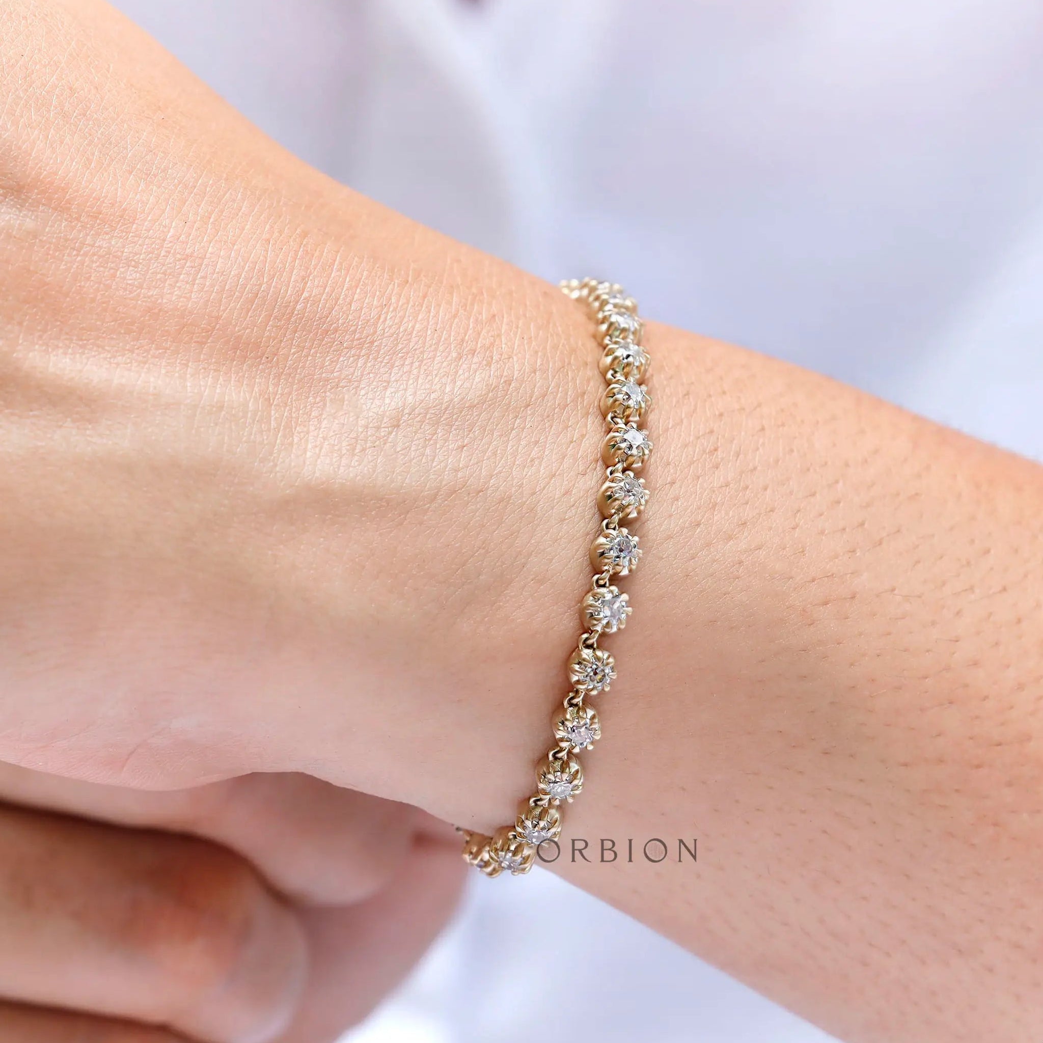 Close up of floating bezel set round diamonds