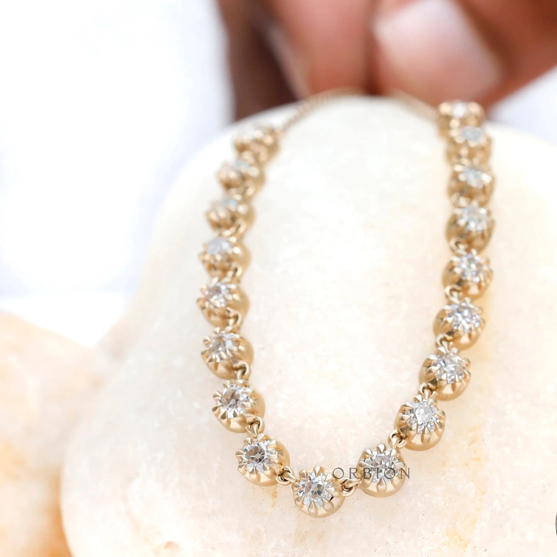 layered statement chain necklace with floating diamonds 