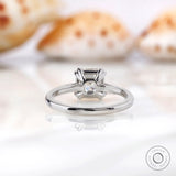 Close-up view of Asscher cut Moissanite solitaire ring with prong setting