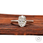 Oval lab grown diamond solitaire ring in 14K white gold